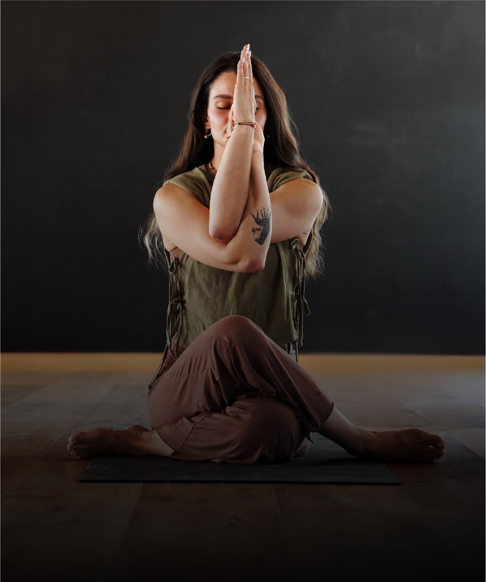 A woman in seated meditation